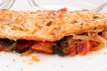 Sea bass with vegetables on a plate