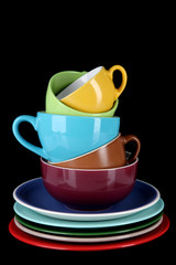 Mountain colorful dishes isolated on black