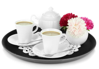 Cups of coffee on tray isolated on white