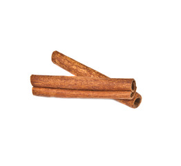 two cinnamon sticks on white background