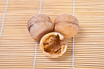 walnuts on a bamboo mat