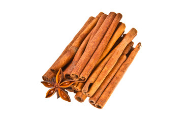 Cinnamon sticks and star anise on white background