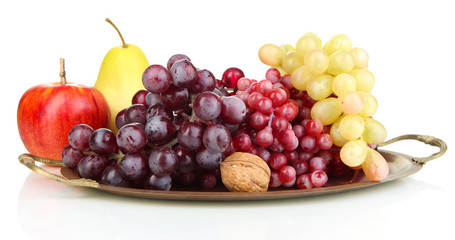 Golden tray with fruits isolated on white