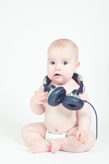 little girl with headphones