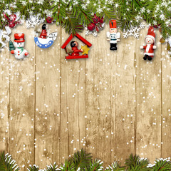 Christmas background with a border of fir branches&decorations