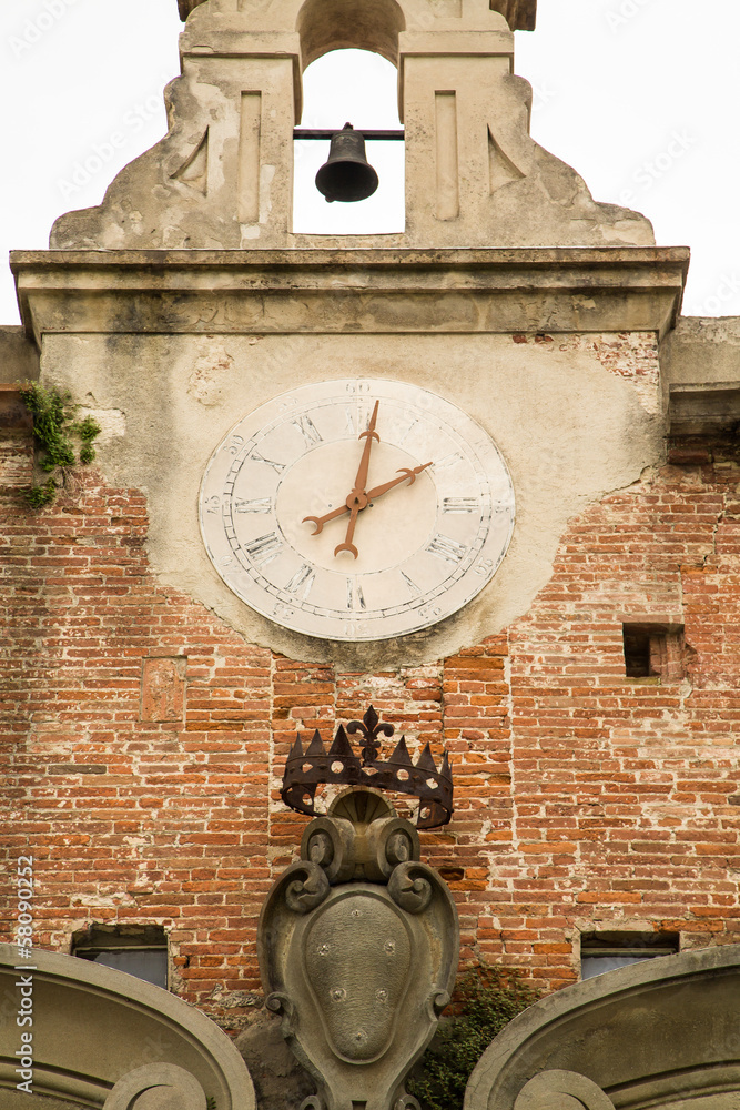 Wall mural old clock and bell tower in pisa