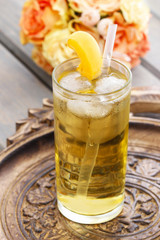 Peach drink on wooden tray