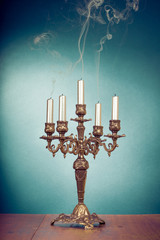 Vintage bronze candlestick with five reek candles