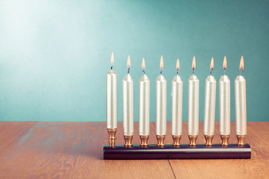 Hanukkah with burning silver candles