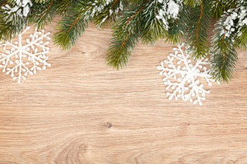 Christmas fir tree on wooden board