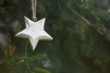 Pine tree with wooden star