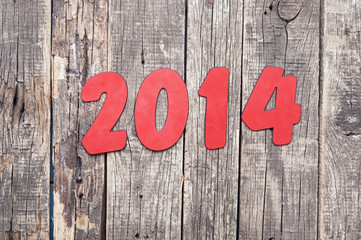 "2014" number on old wood background