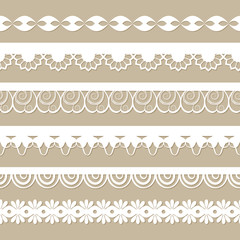 set of seamless paper laces on the beige background