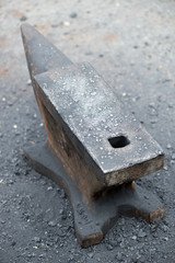 Vertical shot of vintage rustic anvil