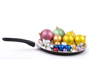 Christmas decorations on frying pan