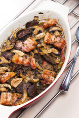 baked chicken livres with bacon and mushrooms on garlic