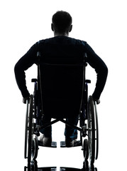 rear view handicapped man in wheelchair silhouette