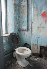 dirty toilet in derelict victorian mill - obrazy, fototapety, plakaty