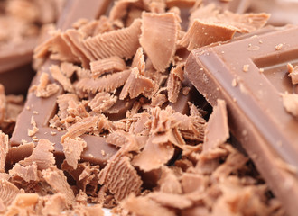 Chocolate shavings close up surface texture.