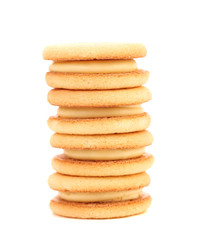 Stack of sandwich biscuits with white cream.