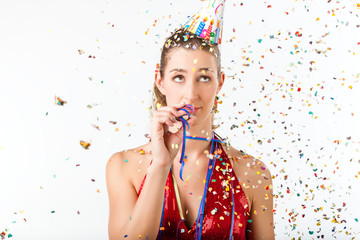 Woman at boring birthday party with streamer