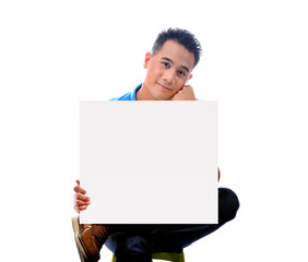 Young man holding blank billboard