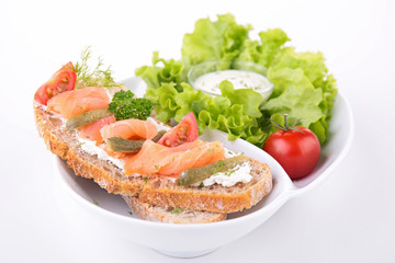 bread with salmon and salad