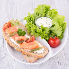 bread with salmon and salad