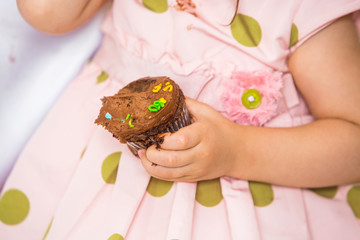 Birthday Girl Holding Cupcake