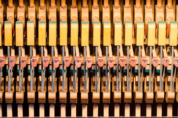 Upright piano dampers and hammers