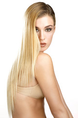 Obraz premium beautiful model showing her perfect blonde straight hair
