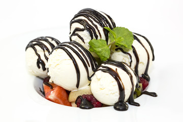 fruit salad and ice cream on white background