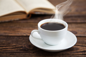 Cup of coffee and a book