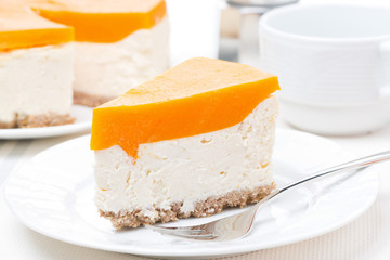 piece of cheesecake with pumpkin jelly