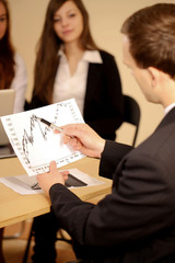 Businessman analyzing a chart