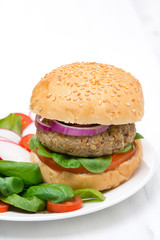 vegetarian burger with fresh salad, close-up