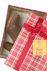 Present box with womans boots inside