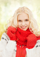 teenage girl in red mittens and scarf