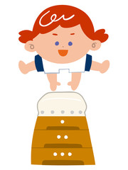 跳び箱を飛ぶ女の子