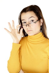 Close-up of a young woman touching her glasses