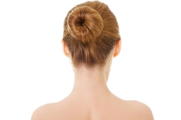 Naked woman's back- head and shoulders.