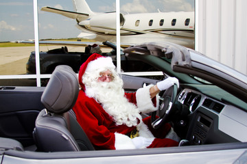 Santa sitting in convertible