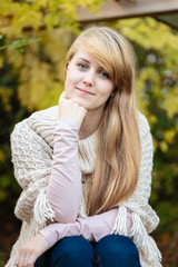 Obraz premium Girl with long blond hair outdoors