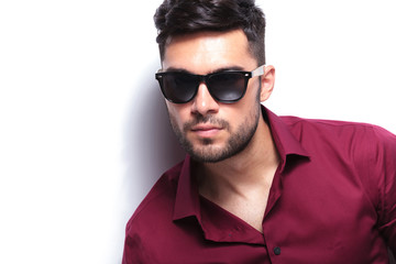 casual man looks at camera