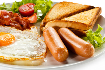 English breakfast - toast, egg, bacon and vegetables