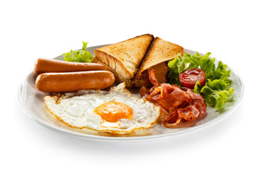 English breakfast - toast, egg, bacon and vegetables