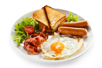English breakfast - toast, egg, bacon and vegetables