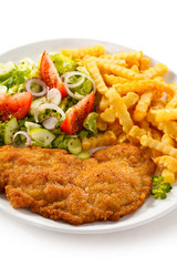 Pork chop, French fries and vegetables