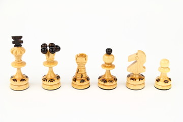 White chess figures on the white background