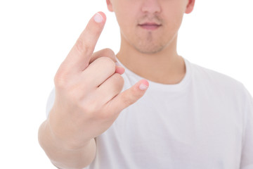 close up of young man showing heavy metal rock-n-roll sign isola